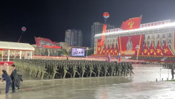 Военные КНДР прошли на параде с флагом России