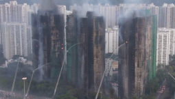 Пожар в Гонконге унес жизни 55 человек, сотни пропали